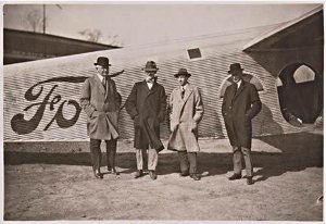 William Mayo, Bill Stout, Edsel and Henry Ford in front of Trimotor