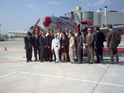 Ruth Holden with David Barger and Corporate people in front of NC18137. 